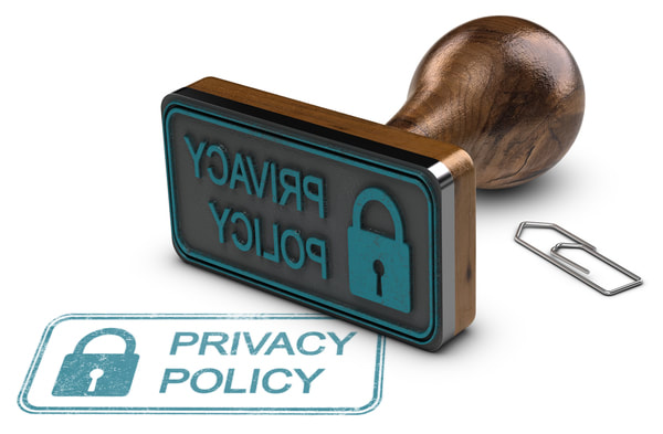 rubber stamp with the words privacy policy on it