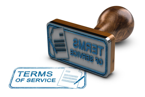 rubber stamp with the words terms of service on it
